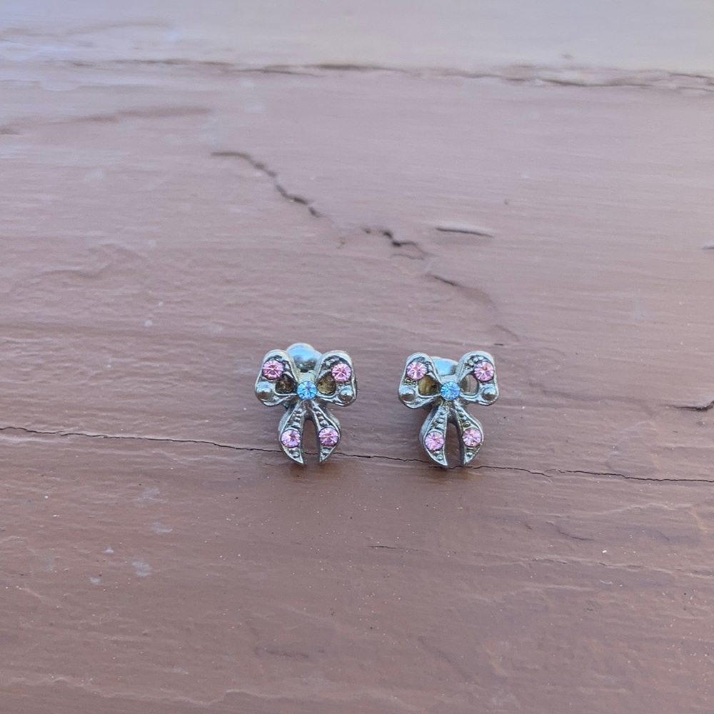 Silver and pink bow earrings